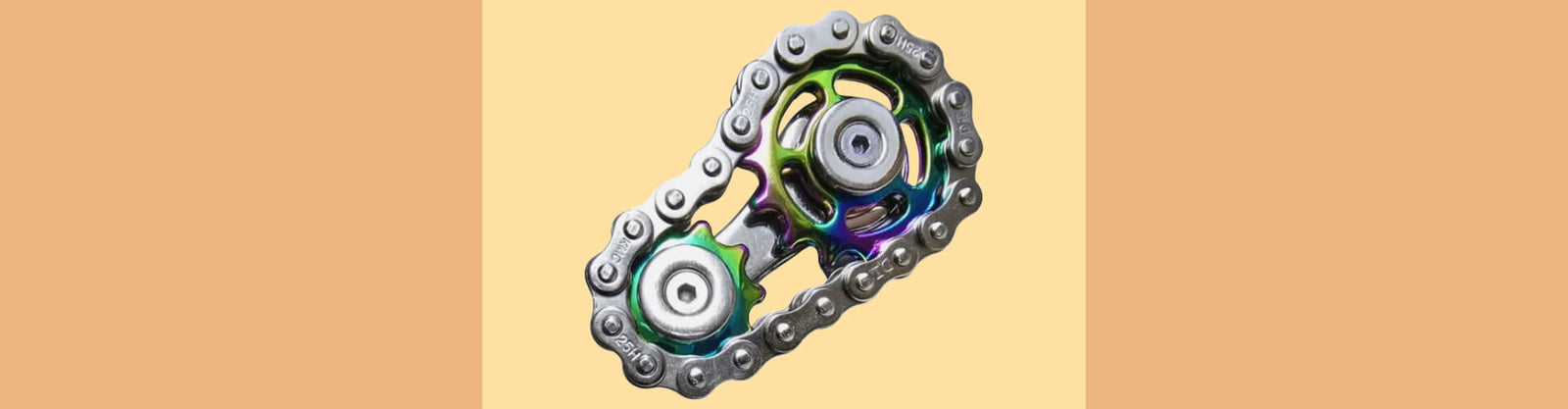 double cog fidget on a 2 toned orange background-fun fidgets double cog fidget on a 2 toned orange background-fun fidgets