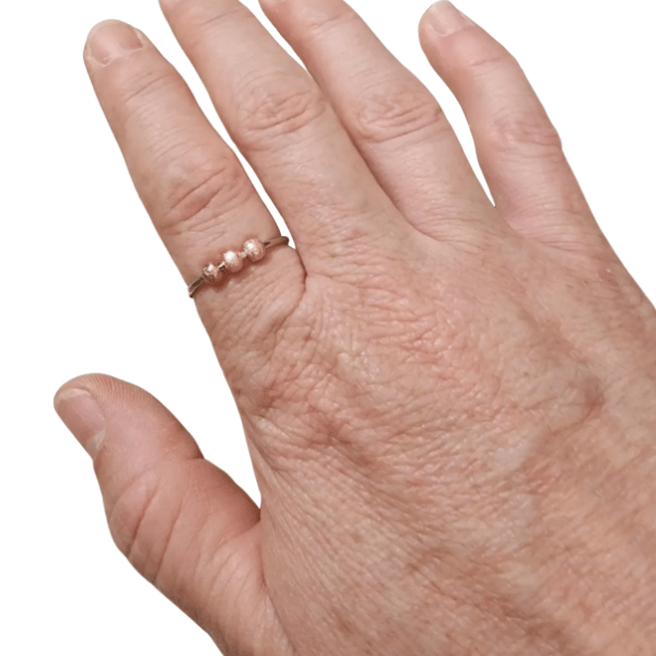 rose petite 3 bead fidget ring shown being worn-fun fidgets
