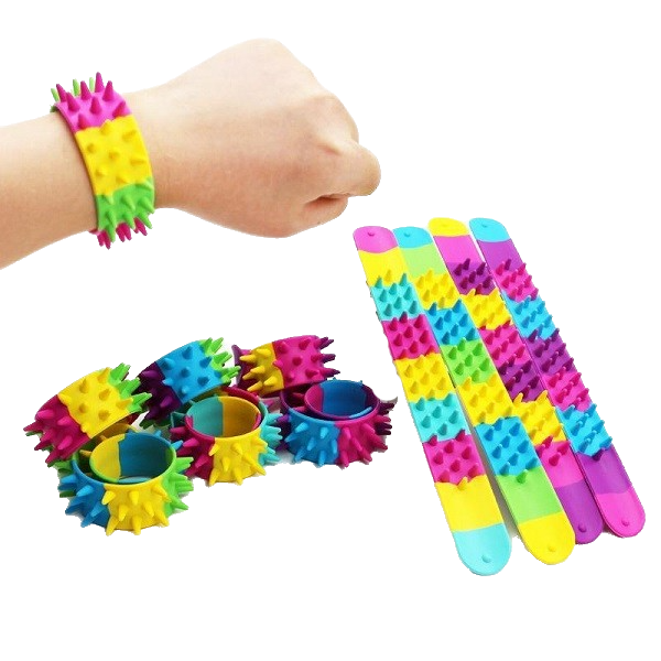 spiky snap bands uncoiled, coiled and shown on a wrist-fun fidgets