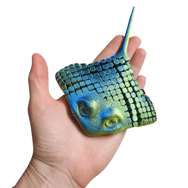 blue 3D Printed Articulated Stingray shown on a hand-fun fidgets