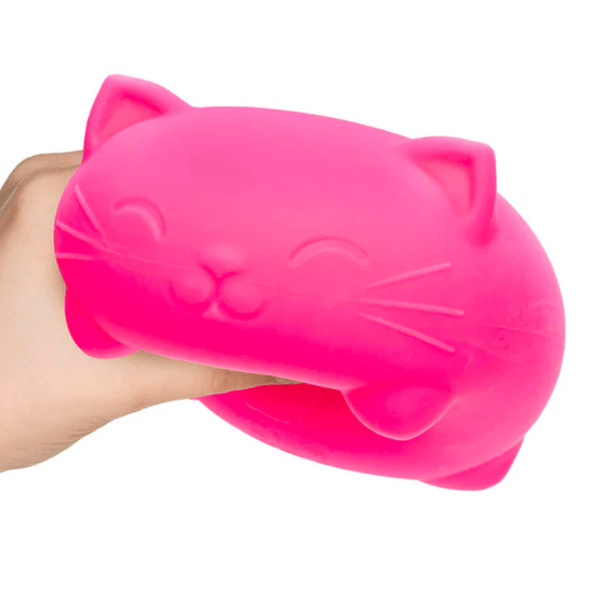 a pink Super Nee Doh Cool Cats being squeezed-fun fidgets