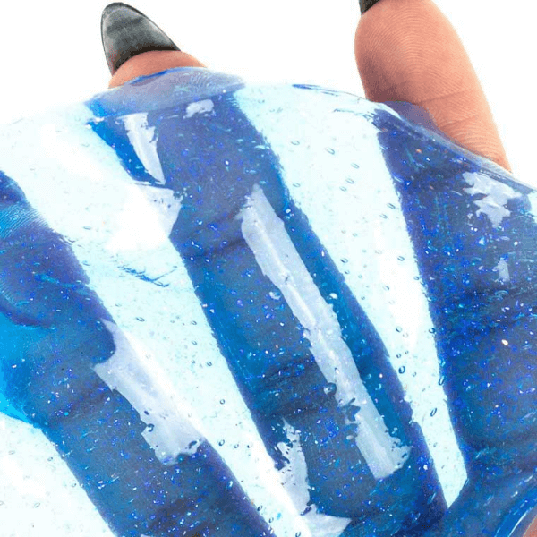 Crazy Aaron&#39;s Thinking Putty-Falling Water shown stretched over a person&#39;s fingers-fun fidgets