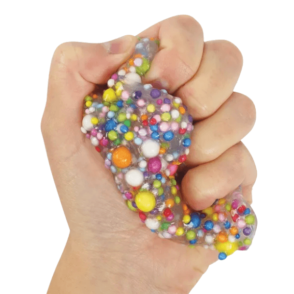 Crazy Aaron&#39;s Thinking Putty-Poke&#39;n Dots clenched in a hand-fun fidgets