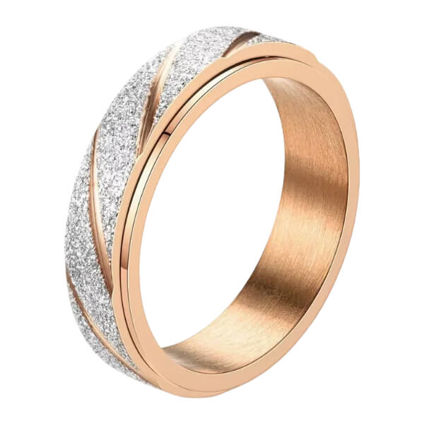 Rose gold and silver spinning fidget ring on a white background-fun fidgets
