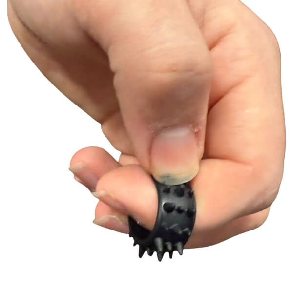 Hand holding a black Halo Picky Band against a white background-fun fidgets