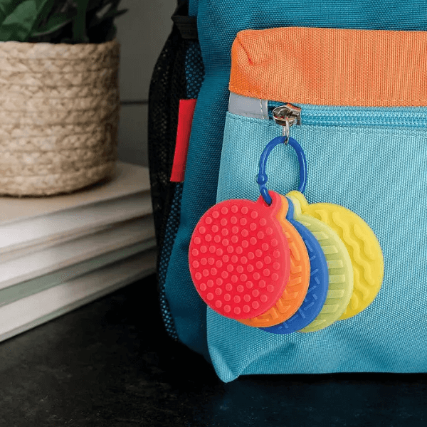 mini sensory genius sensory matsshown attached to a bag-fun fidgets