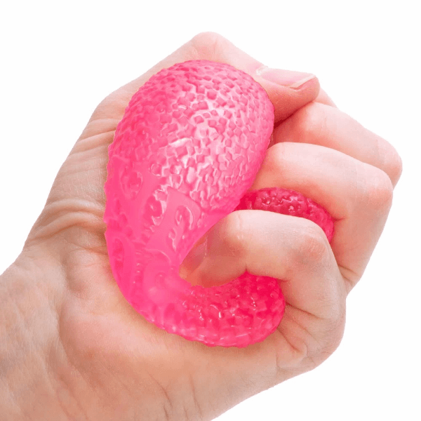 pink Nee Doh Gumdrop being squished-fun fidgets