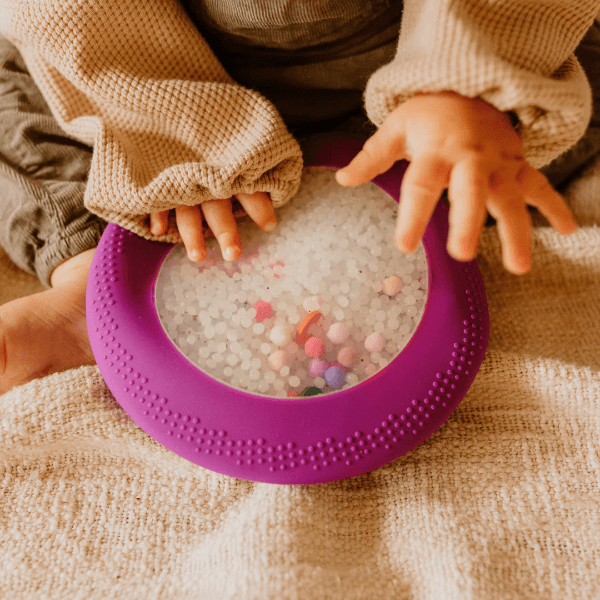 Peekaboo Sensory Bag shown being used by a toddler-fun fidgets