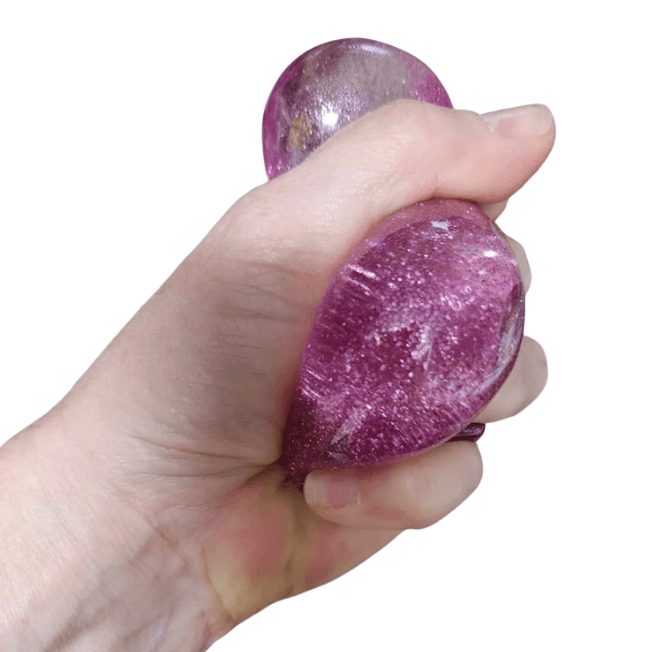 purple Smooshos Glitter Sensory Jelly Cube being squished-fun fidgets