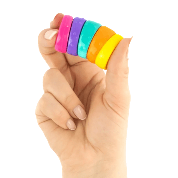 Spin Disc Fidget being held between fingers-fun fidgets