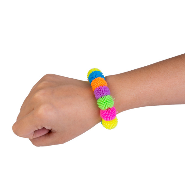 squishy pom pom bracelet shown on a wrist-fun fidgets